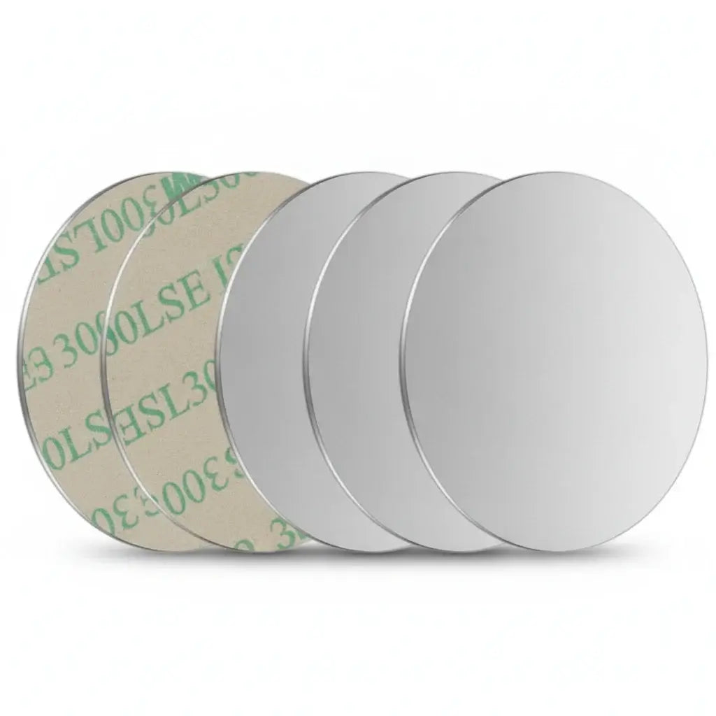 Set of metal mounting plates for Magnetic Car Phone Holder, including various shapes and sizes for universal compatibility.