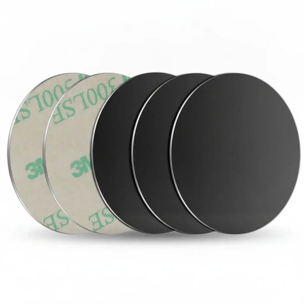 Set of metal mounting plates for Magnetic Car Phone Holder, including various shapes and sizes for universal compatibility.